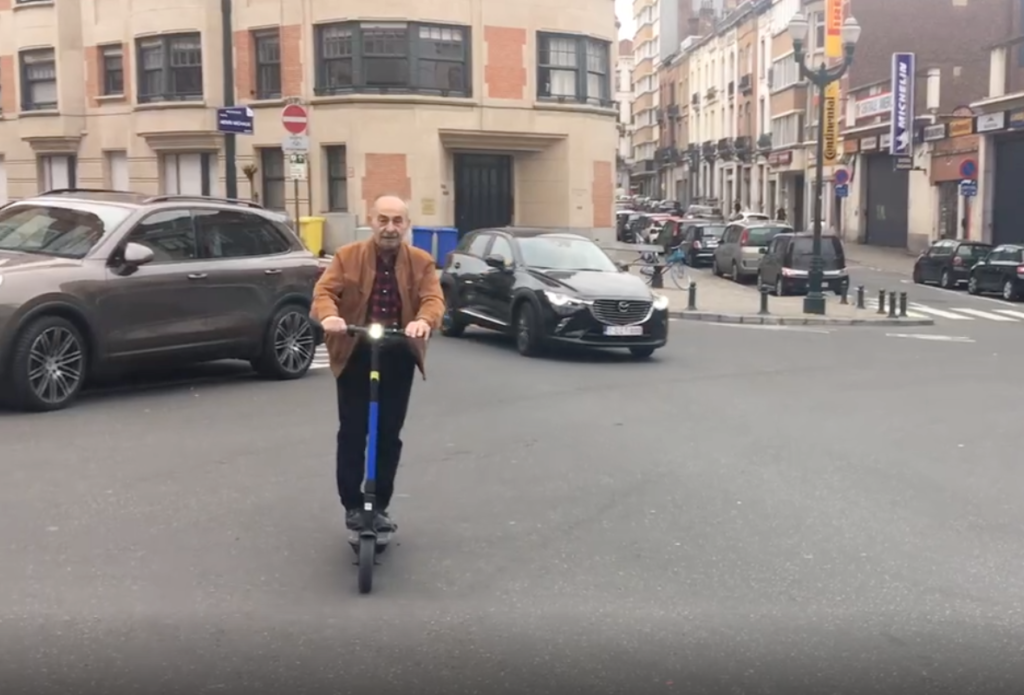Dad scootering in Brussels